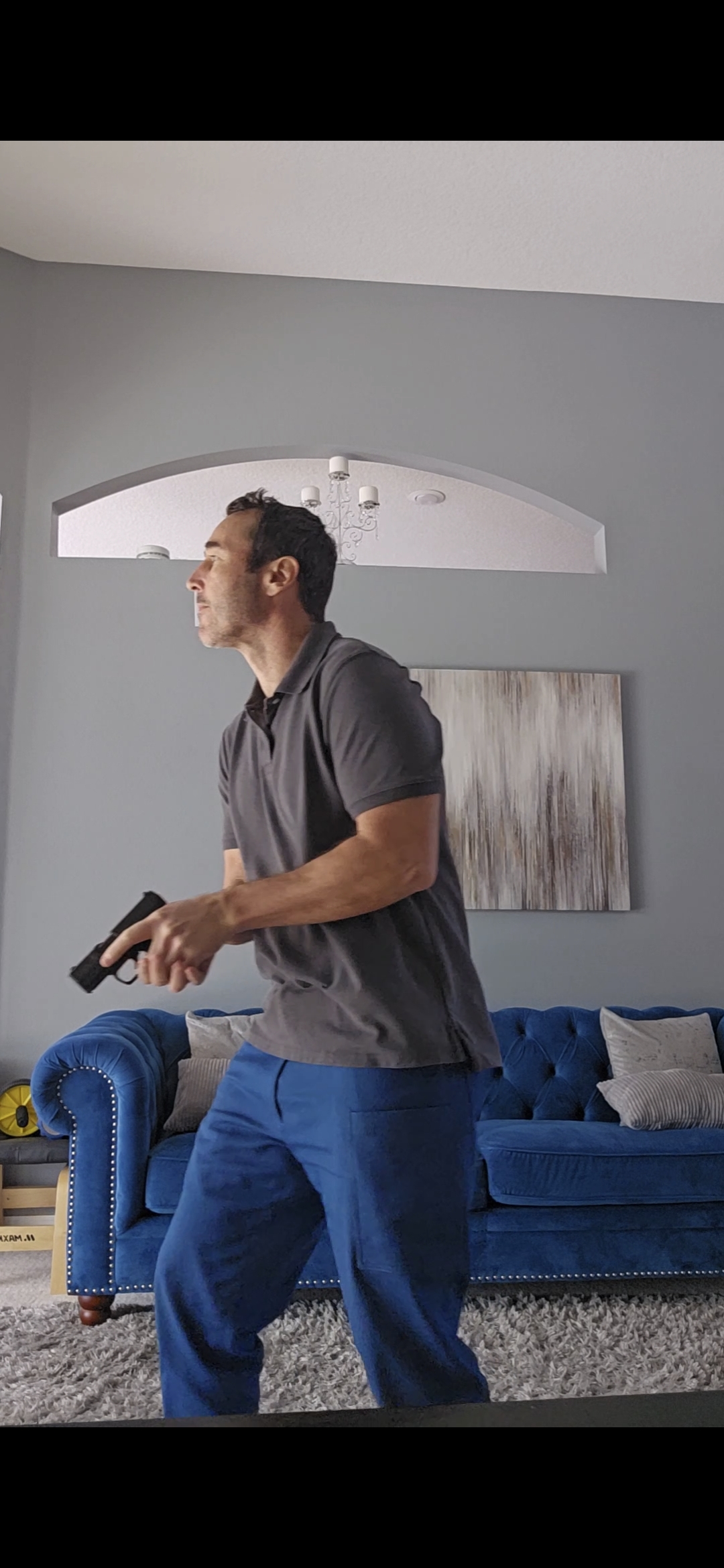 Firearm clearing the pocket opening with full clearance