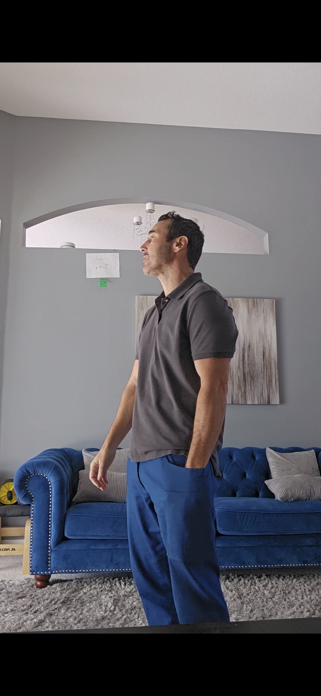 Hand entering the 7-inch pocket opening from above