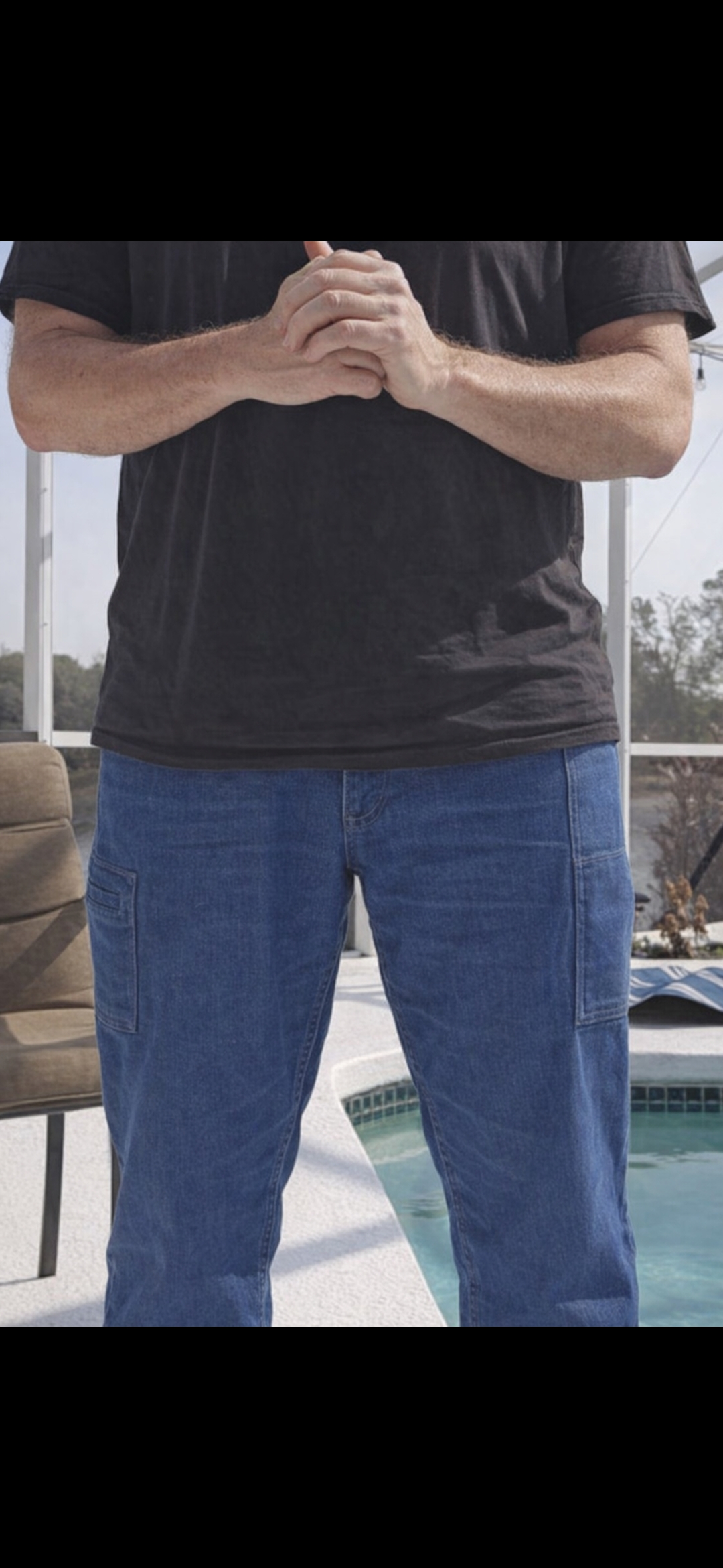 Gunpant concealed carry jeans showing the side-leg pocket placement along the outer thigh.