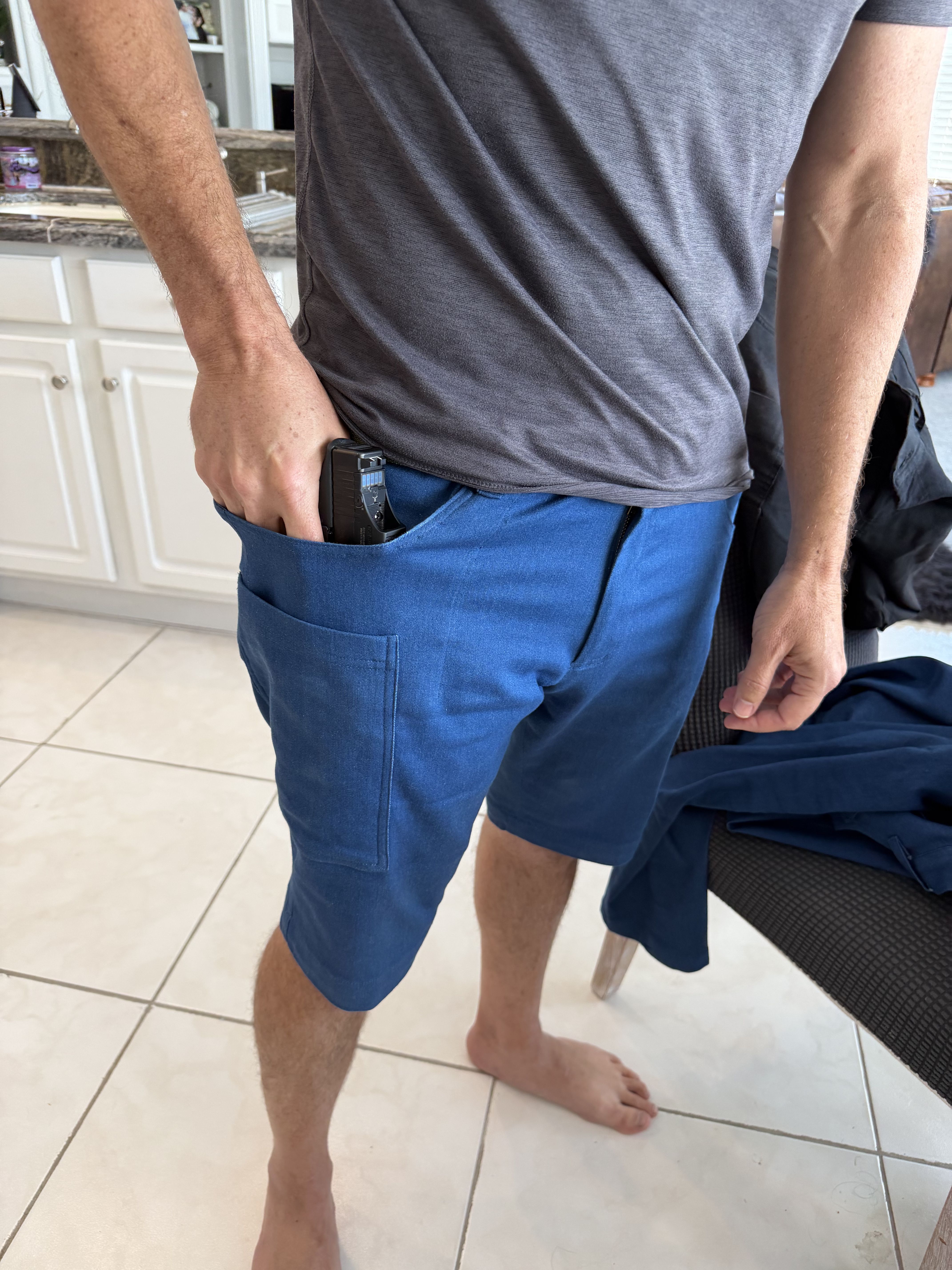Gunpant shorts shown from outside — normal shorts appearance, no visible indication of side-leg pocket system